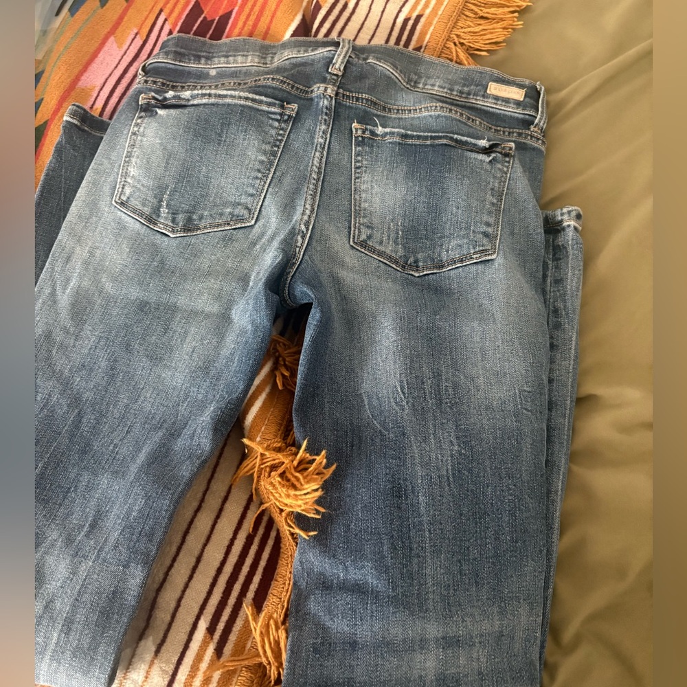 Sneak peak low rise skinny jeans